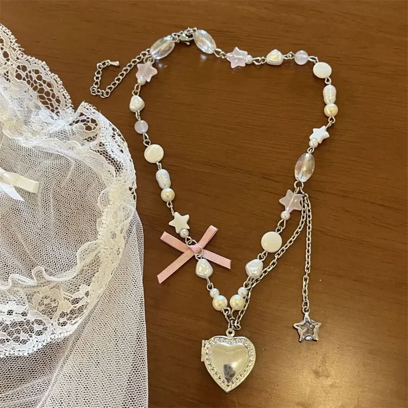 Ожерелье в форме сердца с бантом и звездами