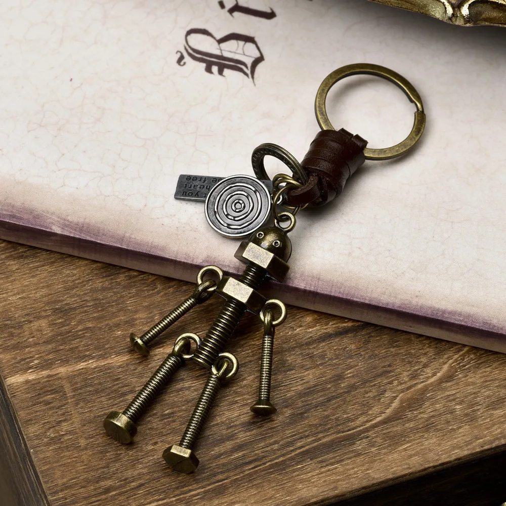 Accessories retro male and female lovers cowhide key chain with movable hands and feet creative robot Keychain