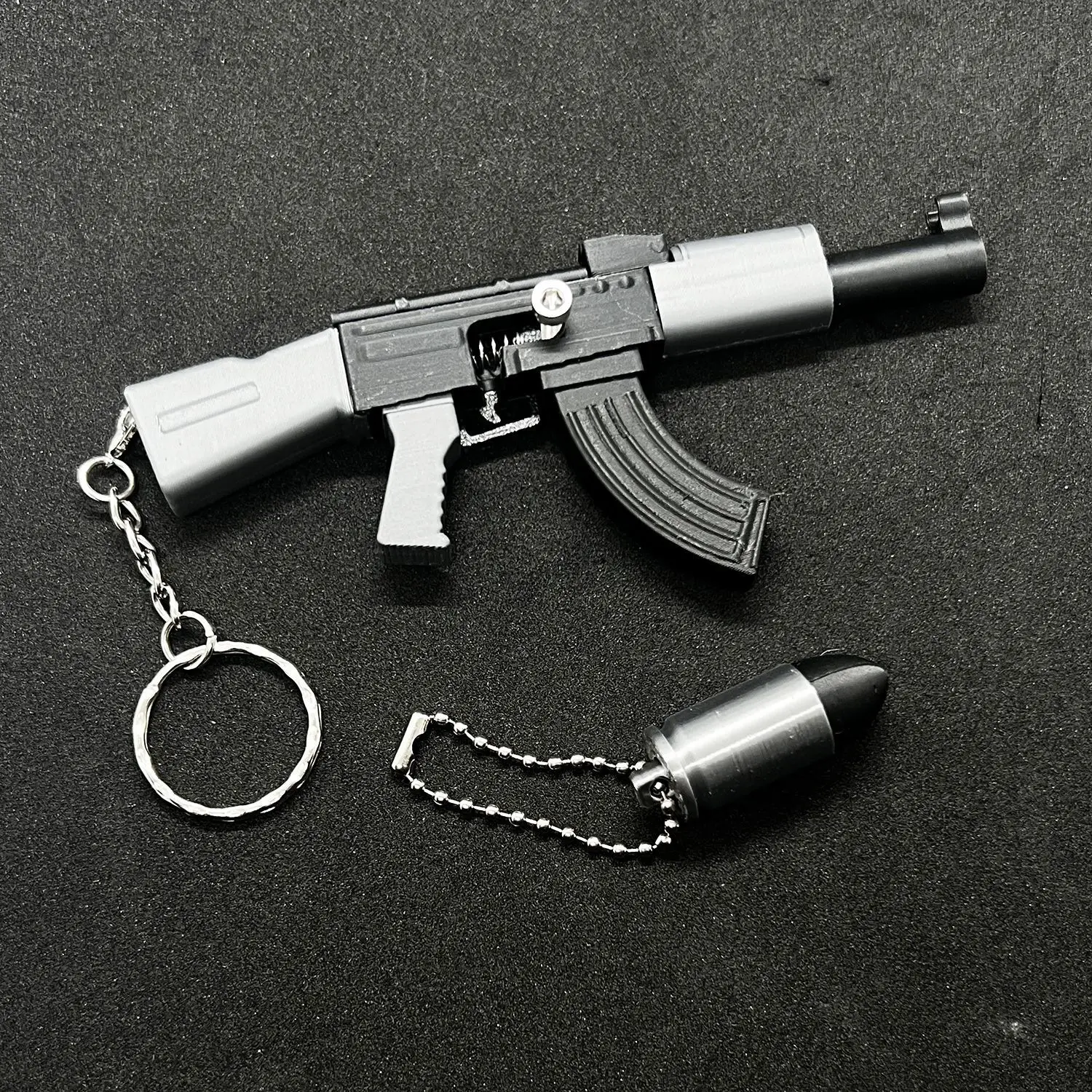 Фото Хит продаж: 3D-печатные мини-пистолеты M90 и AK47, брелоки-подвески для сумок, игрушки-антистресс, необычные подарки для детей и взрослых №3