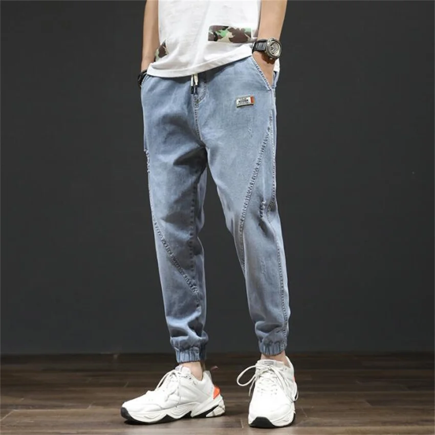 

Spring Japanese and South Korean fashion jeans men's light-colored Harlan pants youth casual pants elastic waist pants men