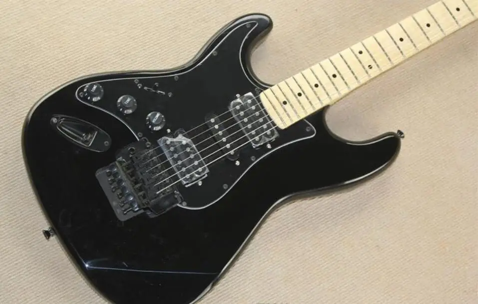 

Custom Left Handed Black ST Electric Guitar Maple Neck, Floyd Rose Tremolo Bridge, Locking Nut, HSH Pickups, Black Pickguard,