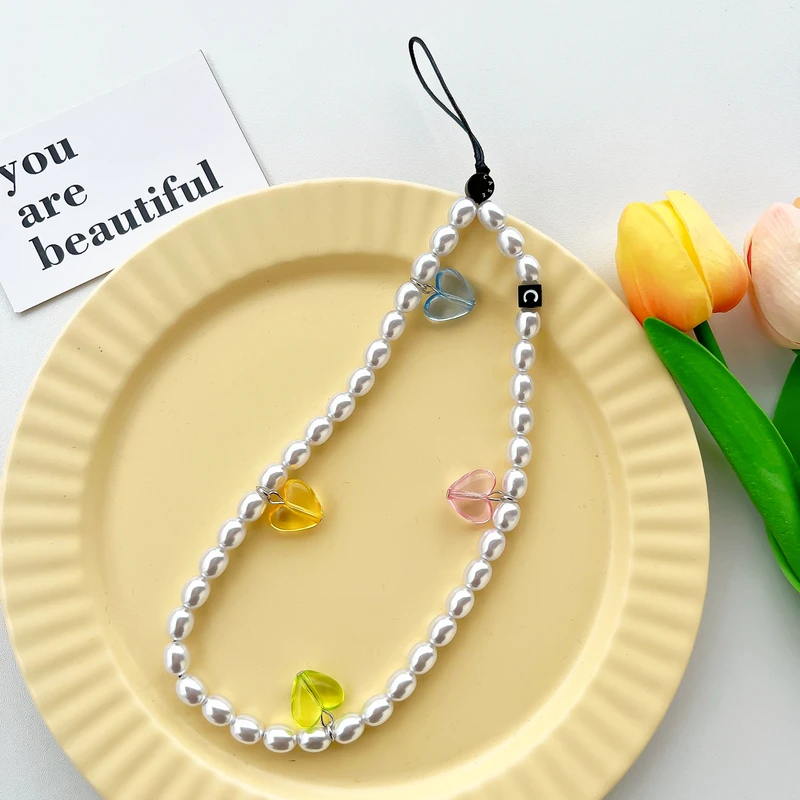 

Luxury Ins Trendy White Pearl Chain Mobile Phone Chains Anti-lost Handmade Acrylic Charm Cord Lanyard for Women Girls