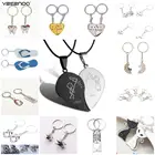 Одна пара посеребренных брелоков из цинкового сплава для влюбленных