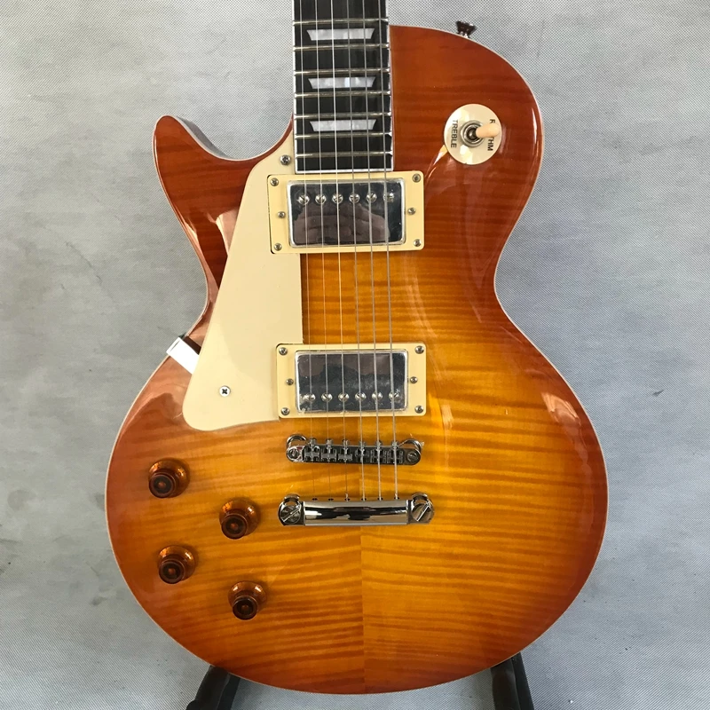 

Hot selling standard electric guitar, left-handed lp guitar, high quality striped tiger maple, mahogany neck wood. free shipping
