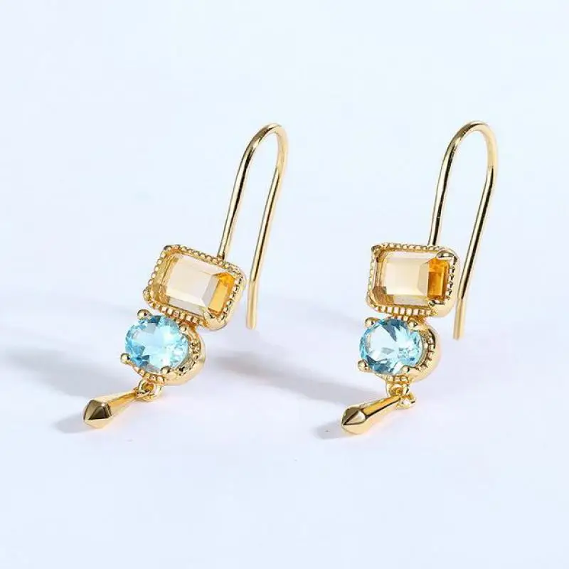 

Серьги-подвески из серебра 925 пробы с натуральным цитрином и золотым покрытием 10 к