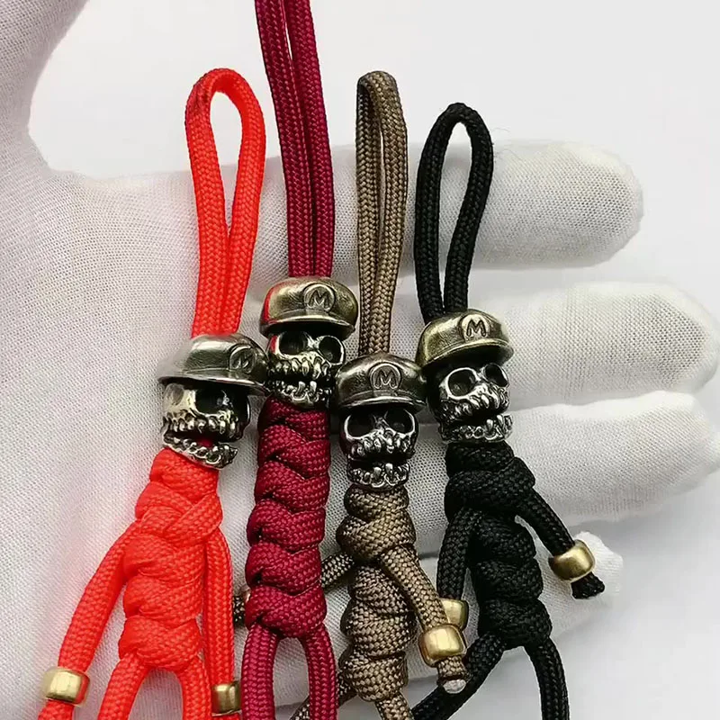 

Skull Head With Hat Brass Knife Beads DIY Paracord Woven Lanyard Pendants Jewelry EDC Outdoor Tool Charms Bracelets Accessories