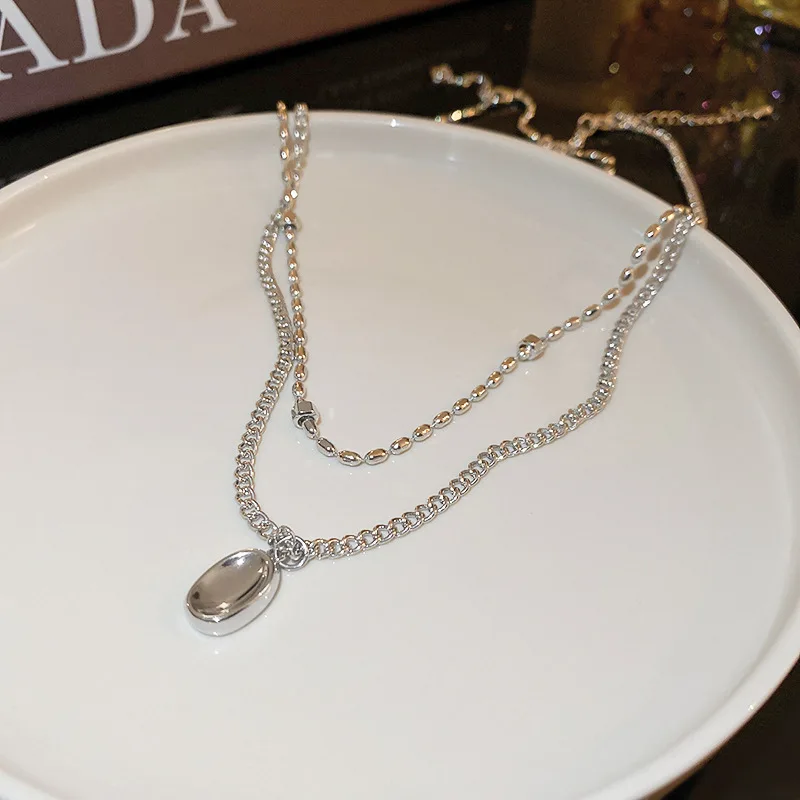 

Oval Bean Geometric Necklace Personality Design Cold Wind Collarbone Chain 2-piece Set Creative Light Luxury Fashion Collars Fem