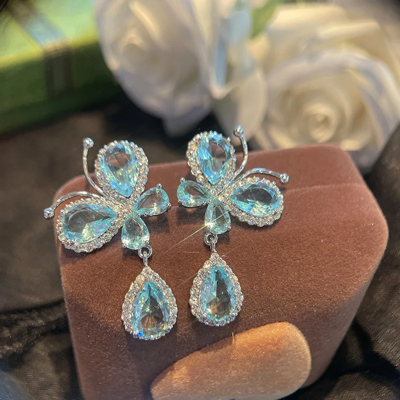 

Women S925 silver needle ins cute butterfly woman new sky blue zircon stud earrings