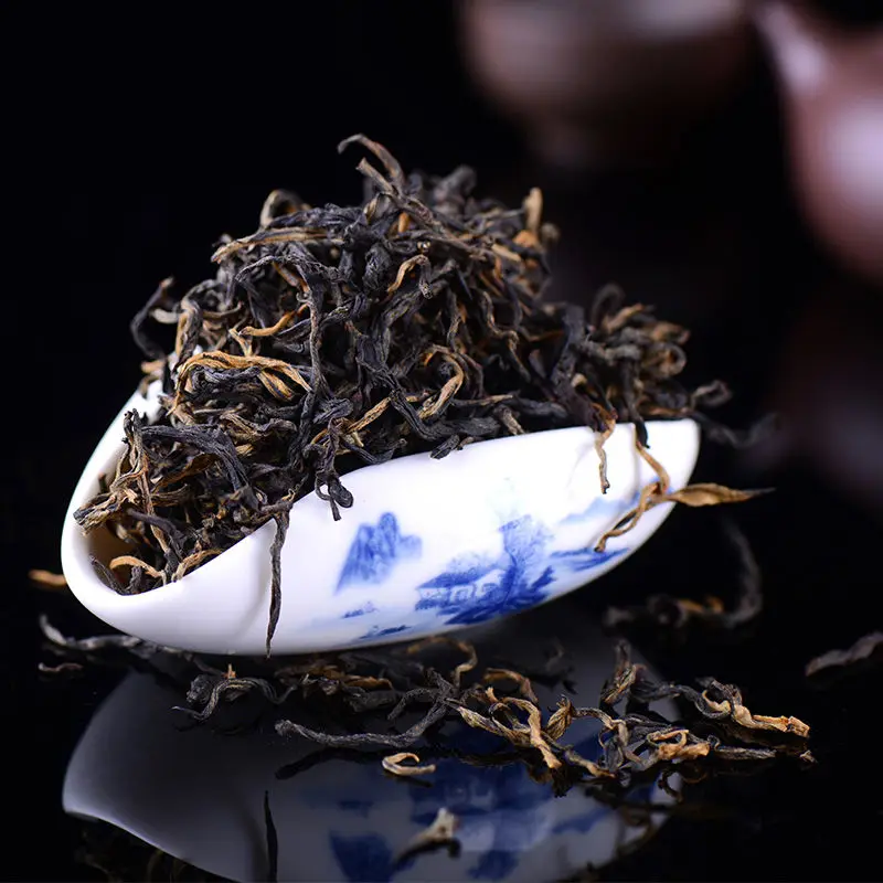 

Yunnan Feng qing Dian hong Sun Red Maofeng Honey Fragrance Black Tea for Clear Heat Warm Stomach and Poria Cocos no teapot