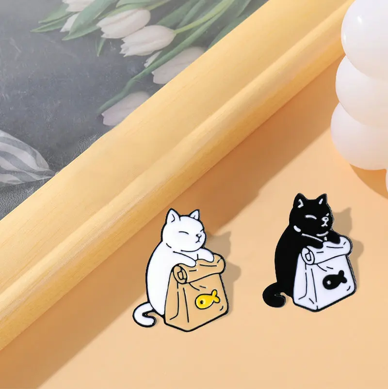 

10 PCS / LOT Feed Myself Enamel Pins Cute Black White Cats Dried Fish Bag Brooches Lapel Badge Cartoon Animal Jewelry