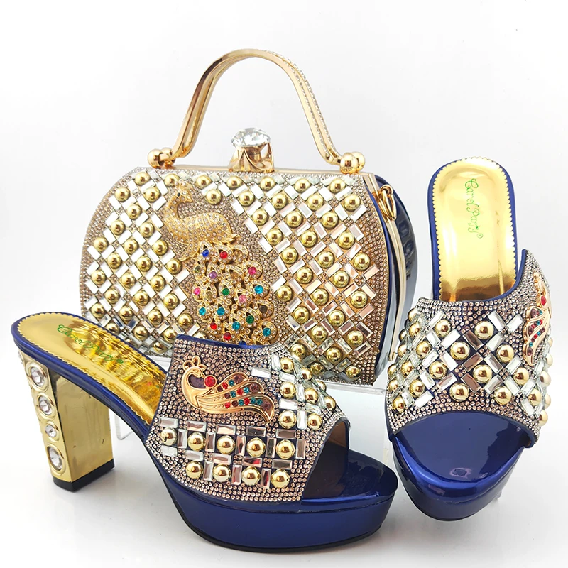 

Новейшие модные туфли и сумки в итальянском стиле ярко-синего цвета, женская обувь и сумка в нигерийском стиле, украшенная металлической формой Феникса