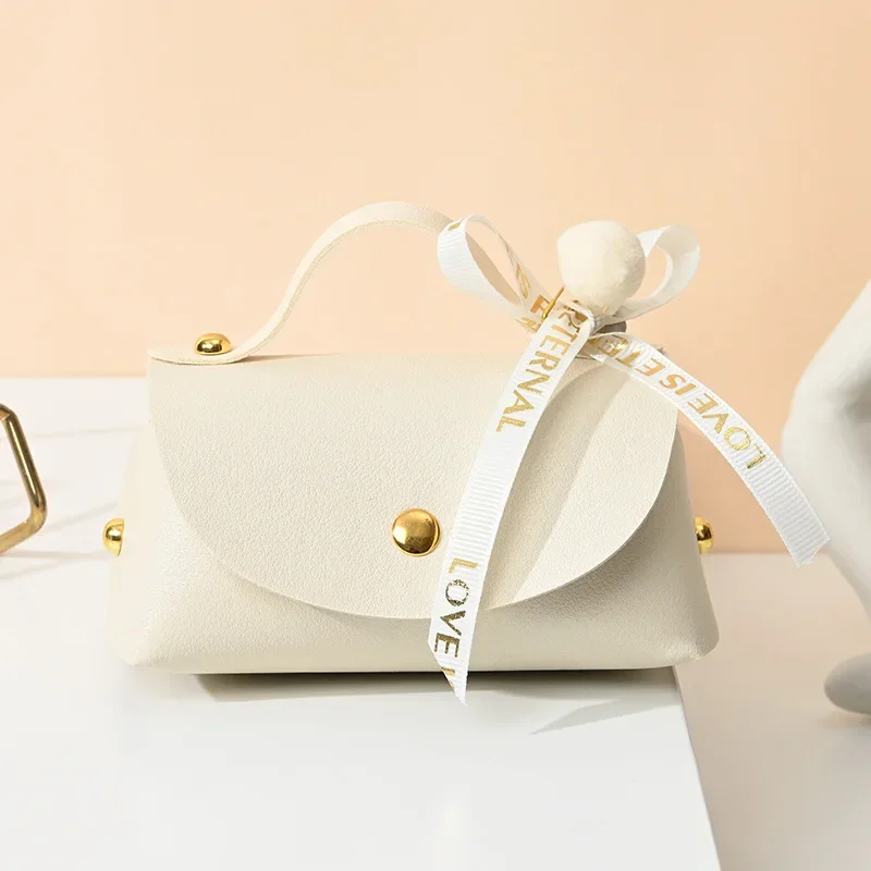 

Кожаные подарочные пакеты с бантом