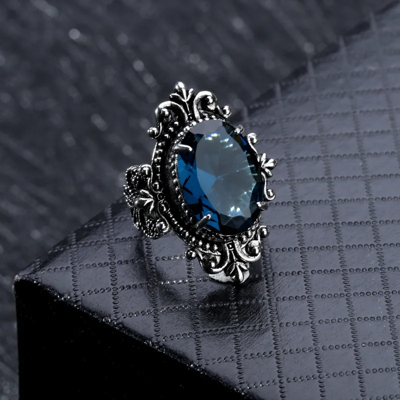 

New Synthetic Sea Blue Topaz Ring European And American Retro 925 Thai Silver Goose Egg Ring