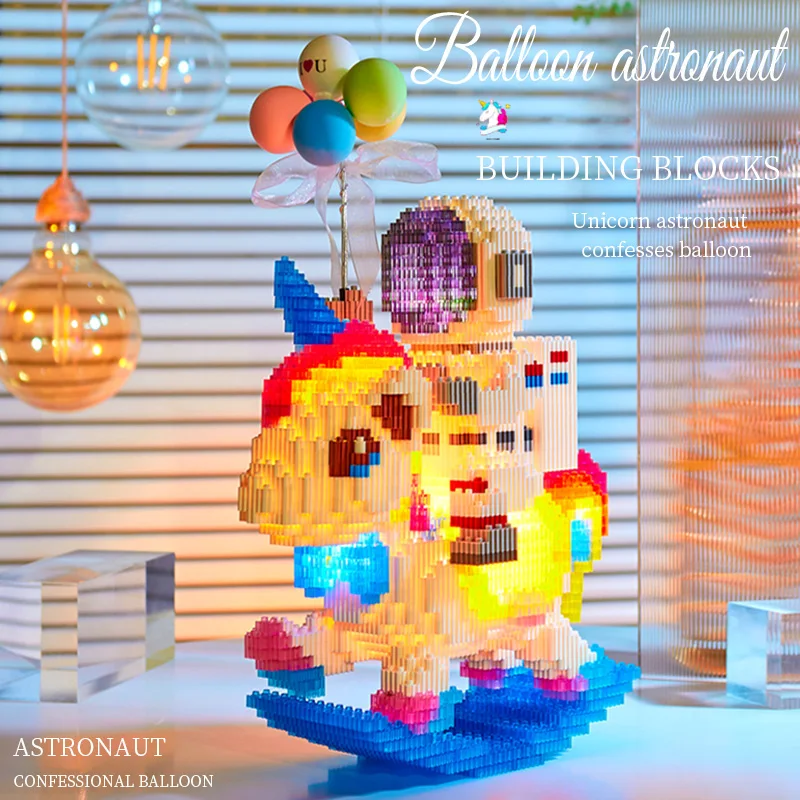 2022 unicornio arcoíris bloques de construcción con luces astronauta juguetes ensamblados adornos de regalo compatibles con bloques de construcción tándem