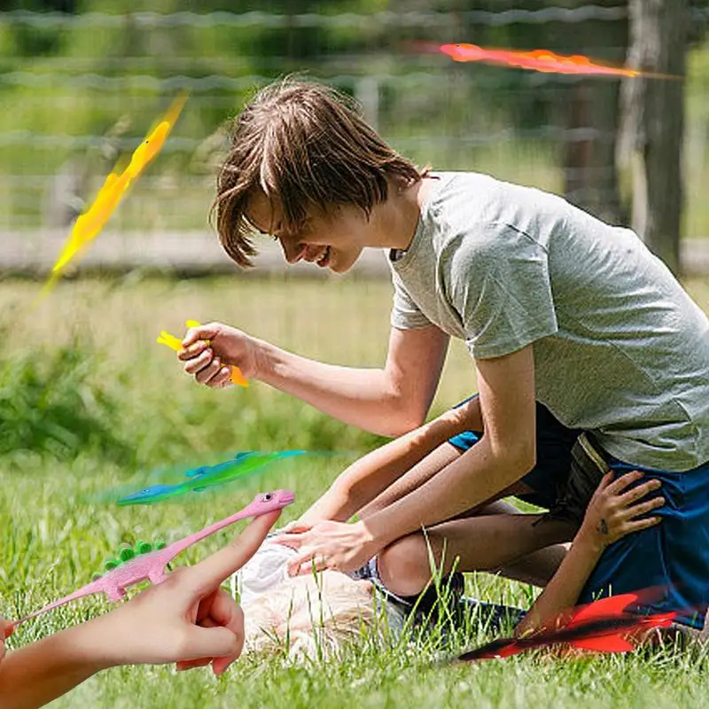 Рогатка для пальцев динозавр мини летающий детские игрушки стрейчевая игрушка с