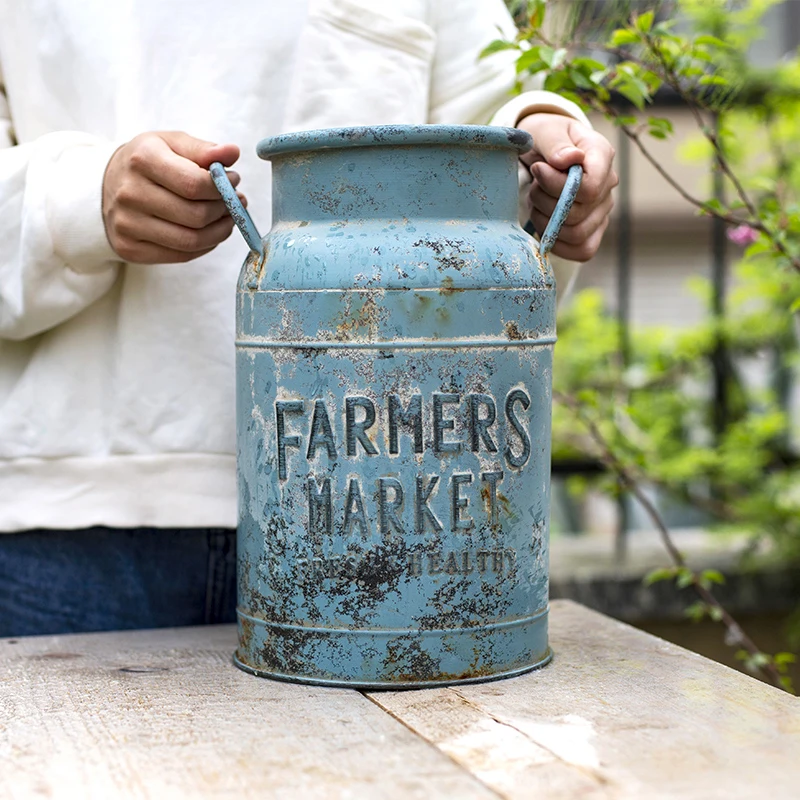 

rustic blue metal milk can flower arrangements