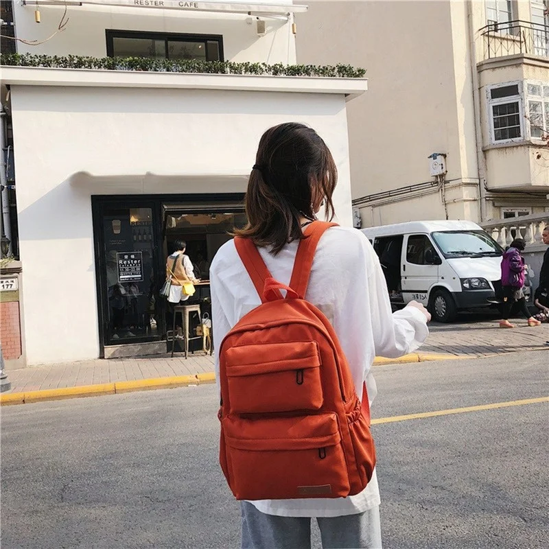 

2023 New Korean Large-capacity Outdoor Backpack Boys and Girls Solid Color School Bag Female Wear Oxford Cloth Student Backpack