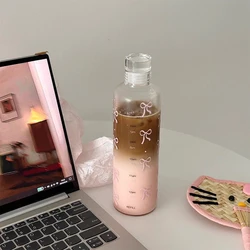 Стеклянные бутылочки с бантиками 