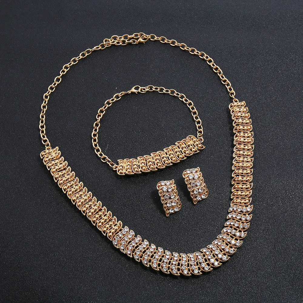 

Комплект из колье, серёг и браслета, из 18-каратного золота