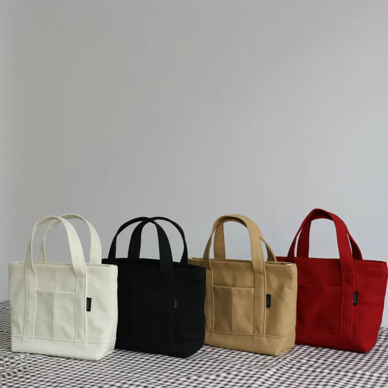 

Japan and South Korea Small Canvas Bag Women's Handbag Literature and Art Simple Lovely Hand Bag Mobile Phone Small Bag Travel