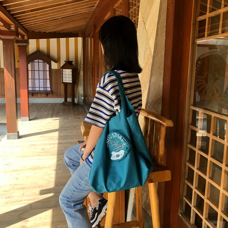 

Double double fold shopping bag portable one shoulder backpack tote