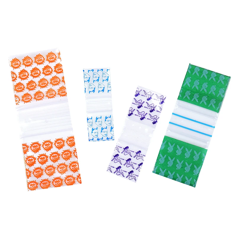 

1.6*2/1.8*2.5/2.5*3/3*4cm 100pcs/bag Random Style Block Small Ziplock Bags Printed Mini Seal Clear Bag Packaging Sealed Bone Bag
