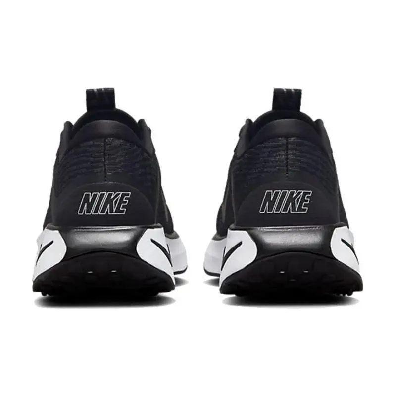 Черные и белые женские кроссовки Nike Motiva
