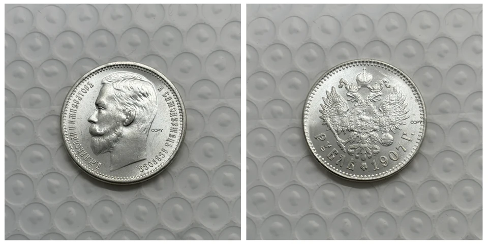 

Коллекционная копия монеты 1907 года Россия Империя Николас II один рубль латунная