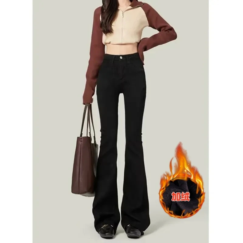 Зимние утепленные широкие джинсы на плюшевой подкладке женские теплые с высокой