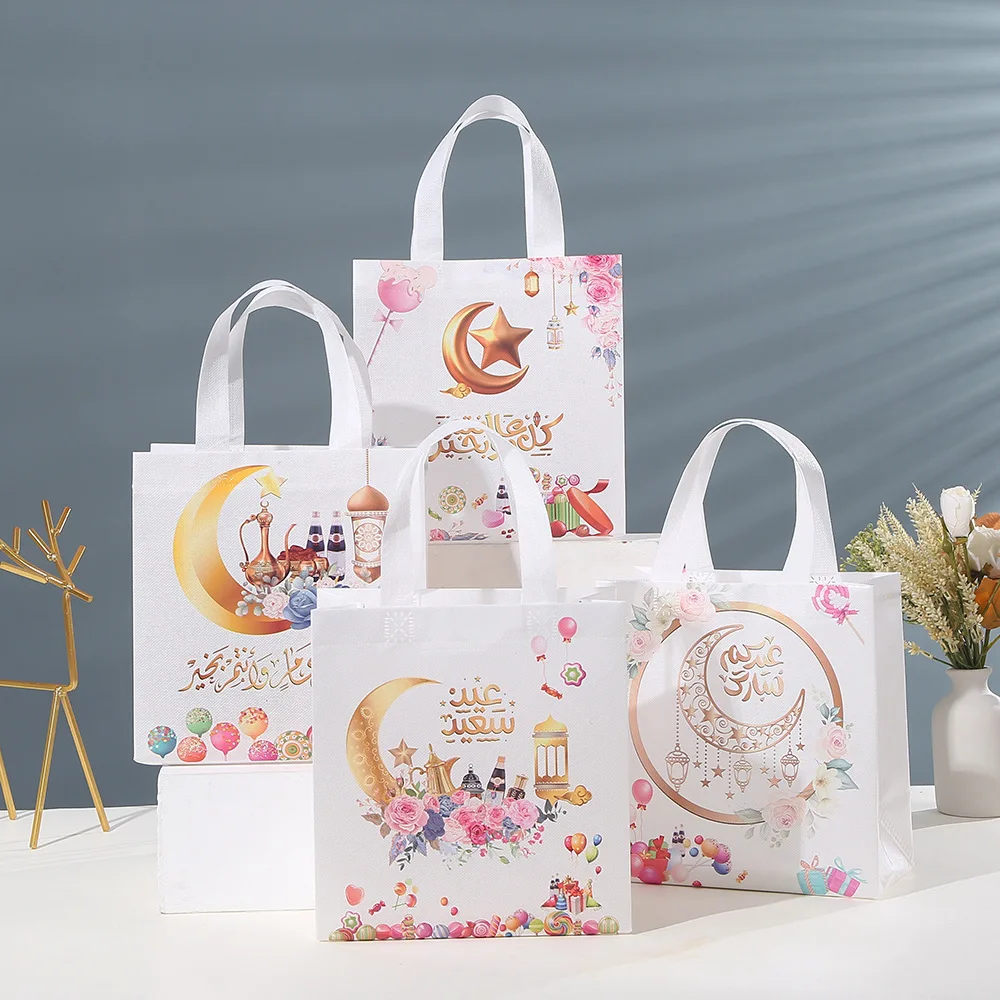 

4PCs Eid Mubarak Nonwoven Fabric Gift Bags Muslim Islamic Festival Party Cookie Candy Packaging Box Ramadan Kareem Favors Supply