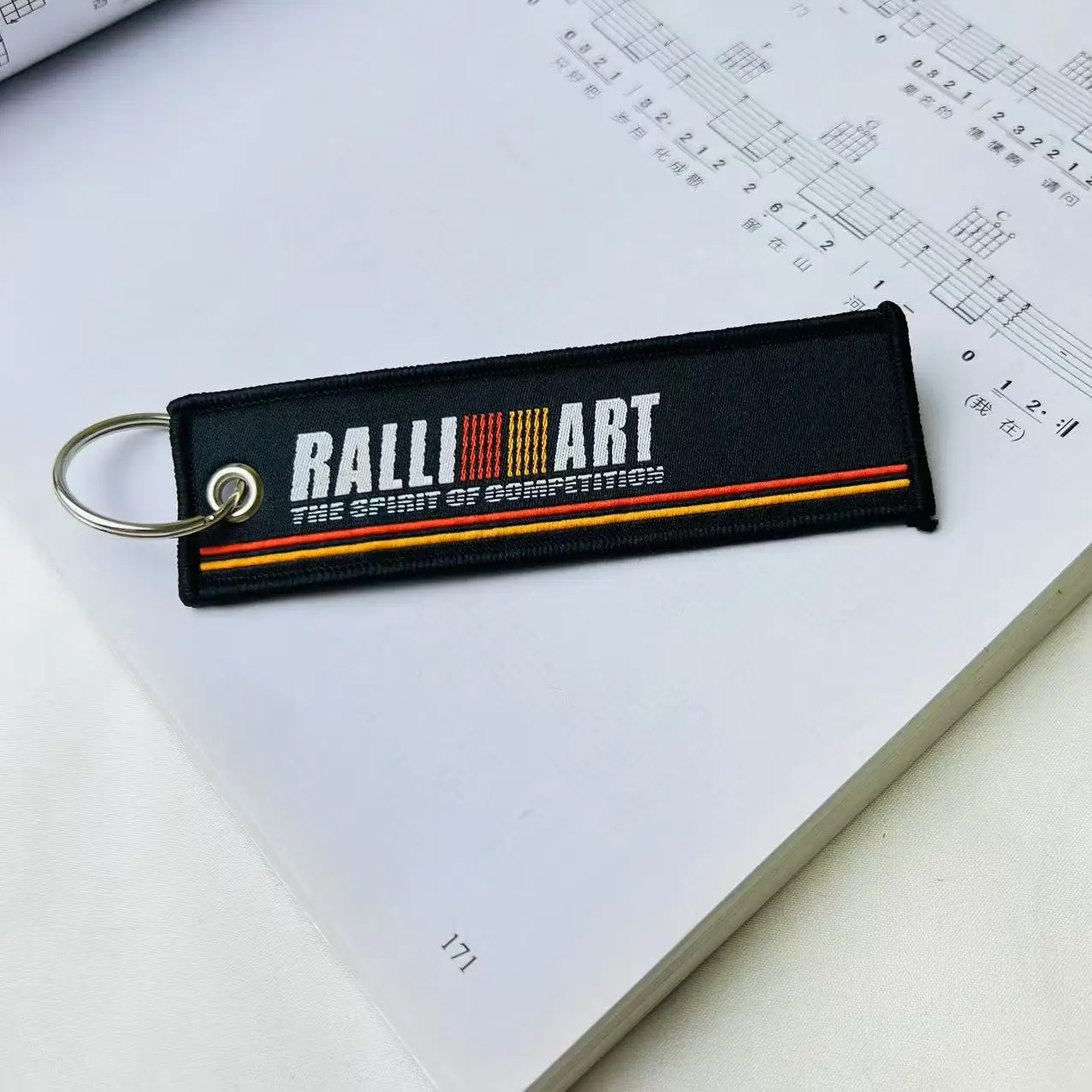 

Автомобильный брелок из ткани Keychian Racing с эмблемой, бирка для ключей, крутые украшения для Ralliart Mitsubishi Pajero Outlander ASX EVO, аксессуары