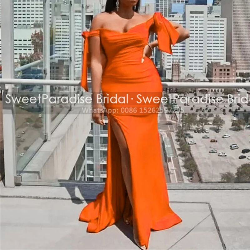 Женское длинное платье подружки невесты оранжевое с бантом открытыми плечами