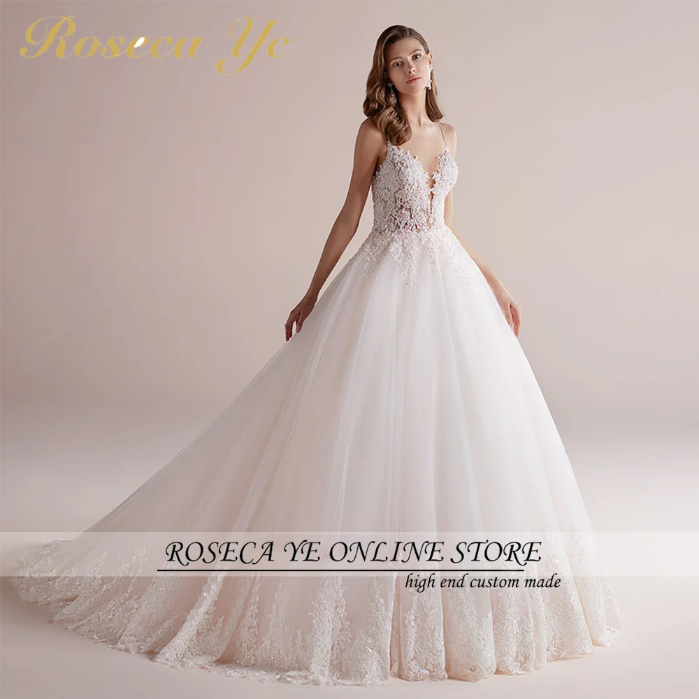 

Roseca Ye A-Line Wedding Dress 2022 Elegant Spaghetti Straps Backless Beaded Lace Appliques Bride Dresses Vestido De Noiva