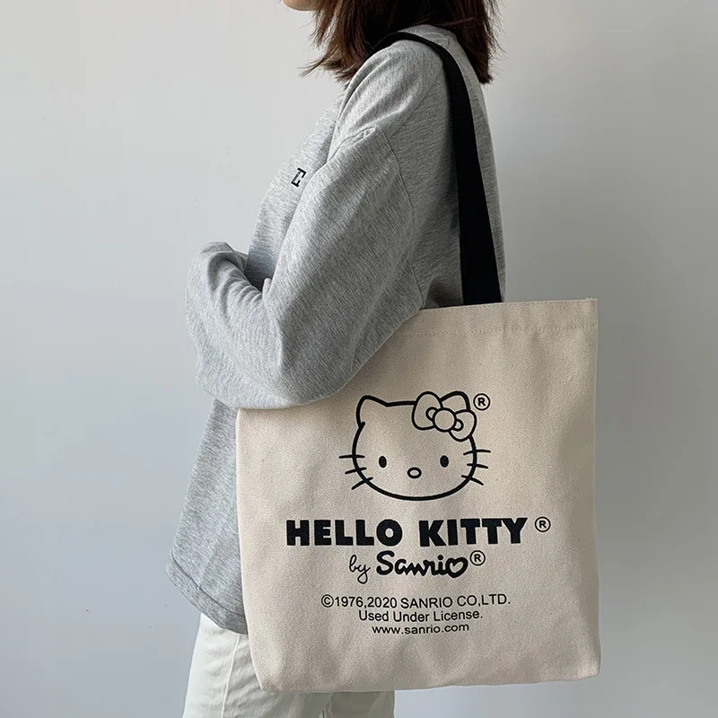 

Sanrio Hello Kitty Kawaii Anime Printed Bag Fashion Canvas Shoulder Bag Korean Version Portable Shoulder Highcapacity Makeup Bag