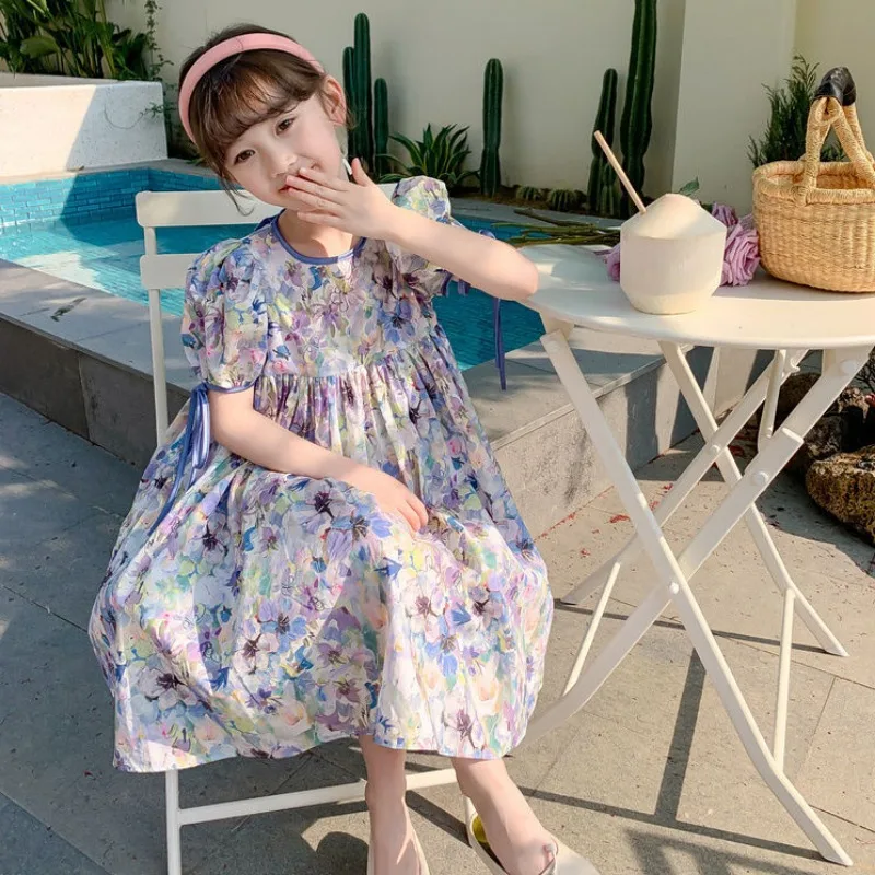 Женское летнее платье с открытой спиной и коротким рукавом