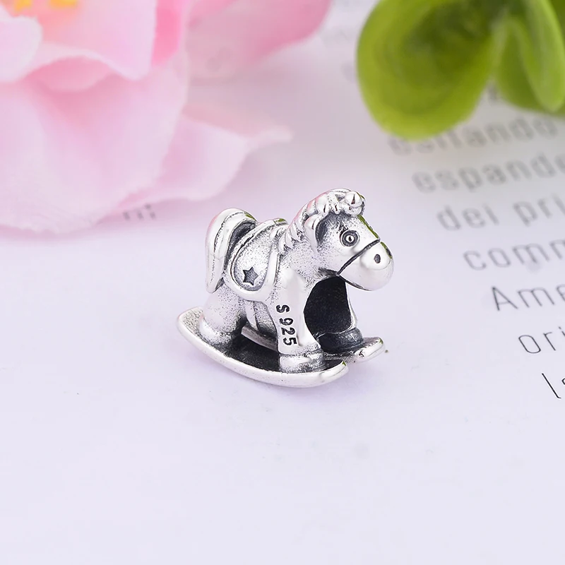 Браслет-качалка в виде лошади-качалки из серебра 100% пробы