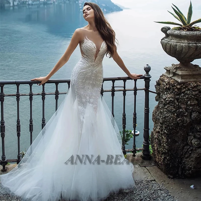 

Anna Sexy Trumpet Wedding Dresses Tulle O Neck Sparkly Appliques Illusion Wedding Gown For Bride Made To Order