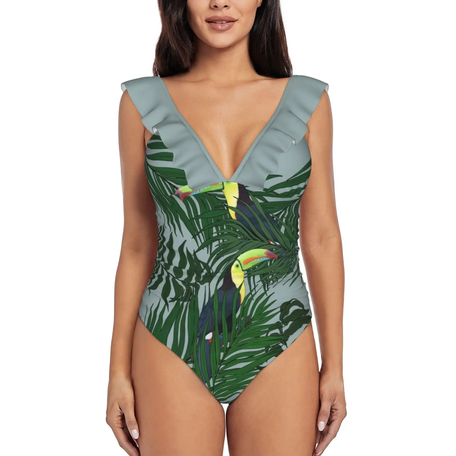 

Купальник женский сплошной с оборками и листьями пальмы