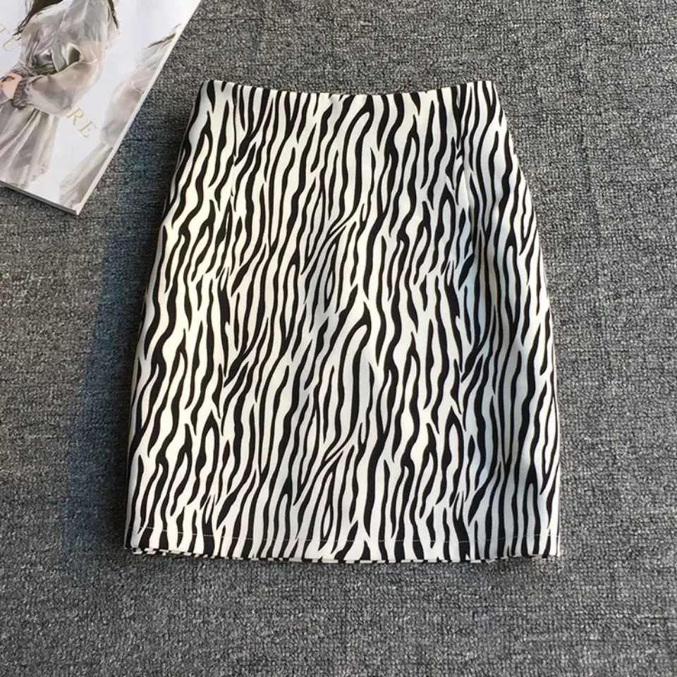 Zebra print skirt for women in spring and autumn of 2023, new style buttock skirt, high waist A-line  spicy short skirt trend