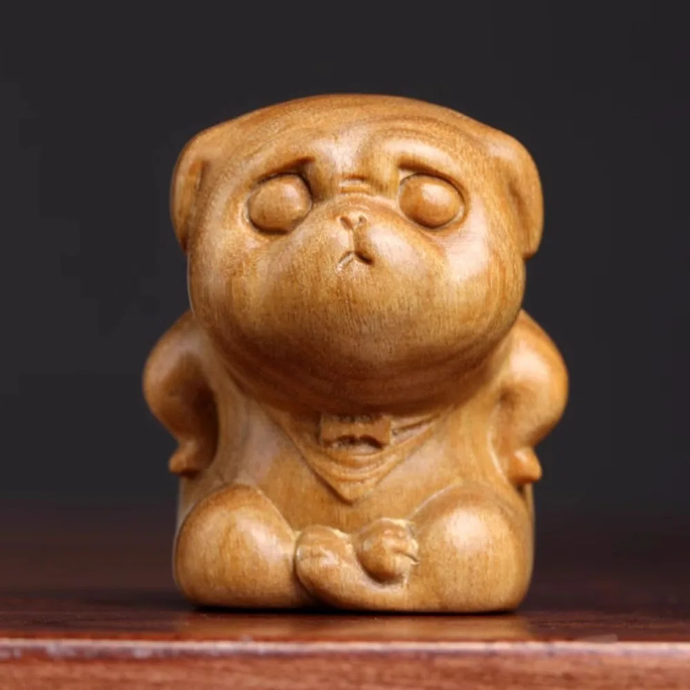 

Деревянная статуэтка собаки из сандала