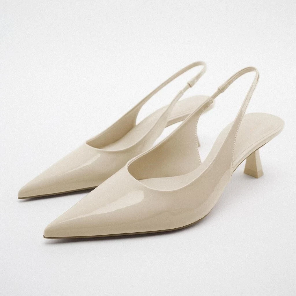 

Женские лакированные туфли-лодочки на низком каблуке, с острым носком