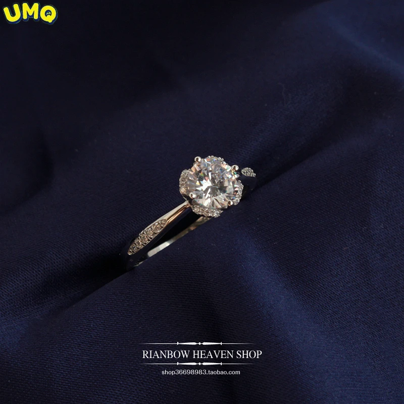 

925 Sterling Silver High Setting Flower with 1 Carat Beautiful Mausan Zircon Fake Diamond Proposal Gift Is a Popular New Product