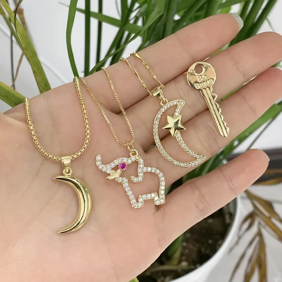 

New Design Hot Sell Jewelry Key Pendant Necklace Exquisite Hollow Moon Star Necklace Chain Elephant Charm Pendant Jewelry