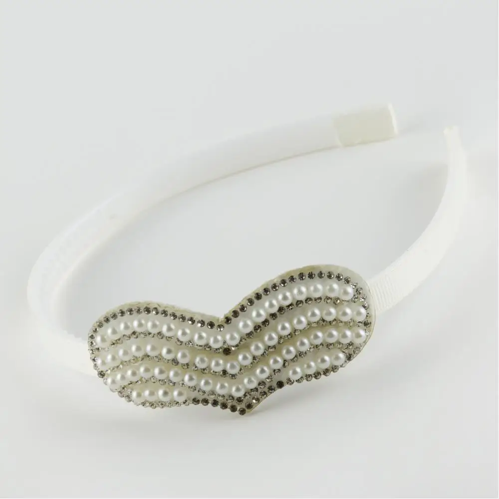 

Heart Figured With Pearl Metal Crown