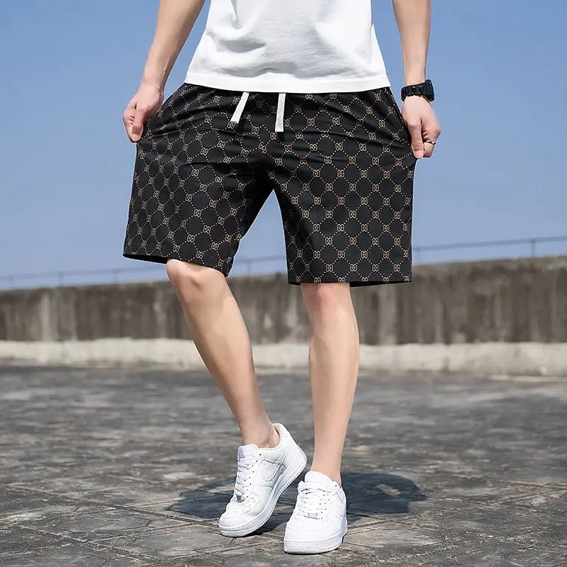 Summer shorts for men in 2023, new fashion trend, ice silk quick drying men's five piece pants, beach pants, half length medium
