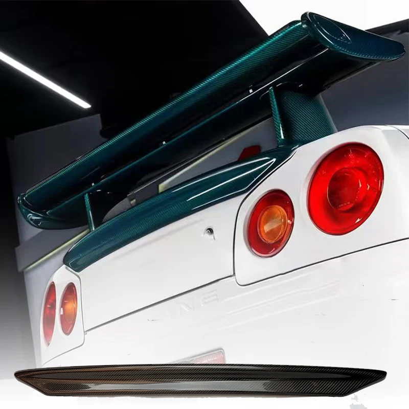 Фото Карбоновый спойлер на задний багажник для Nissan Skyline R34 GTR/GTT №3