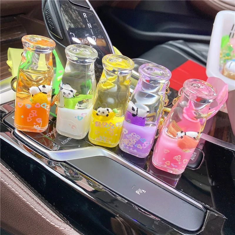 

Netflix Animal into the Oil Keychain Fruit Panda Liquid Floating Bottle Delicate Quicksand Pendant Phone Bag Charm Wholesale
