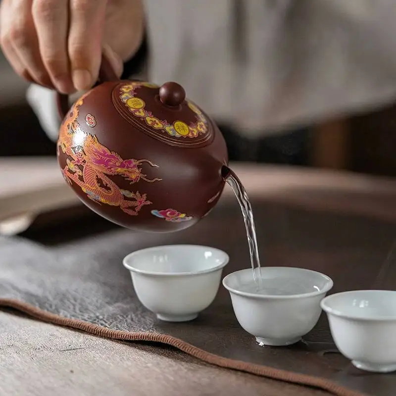 Фото Чайник Xishi Fengming из фиолетовой глины ручной работы с изображением Феникса и дракона, меняющий цвет, для домашнего использования, от Wu Chengzhi №4