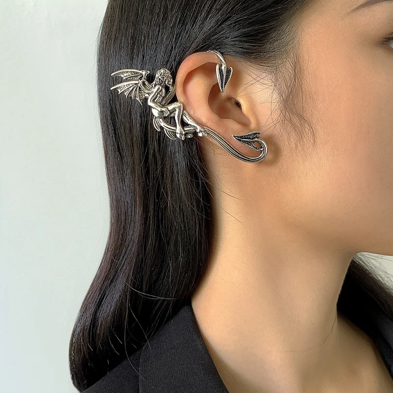 

U-Magical Cool Cartoon Angel Clip Earrings for Women Exaggerated Silver Color Metal Wings Irregular Earrings Halloween Jewelry