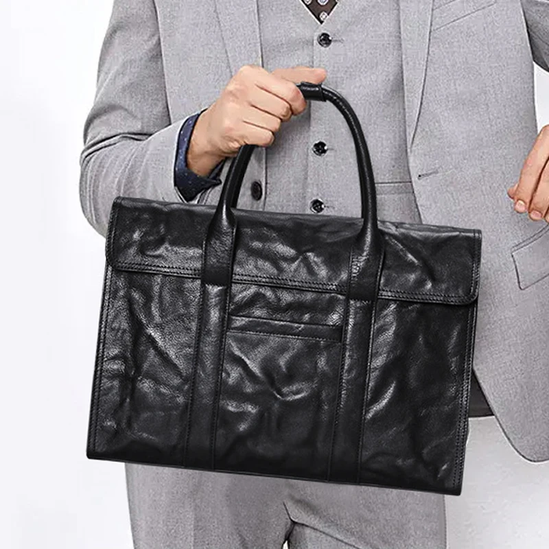 AETOO  New commuter casual men's handbag hand grasp leather men's baotou layer cowhide large capacity men's briefcase bag